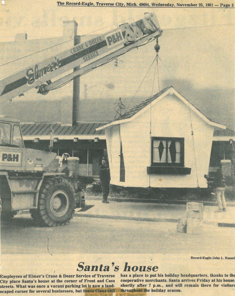 Team Elmer's Crane lifting Santa's House in 1981